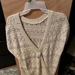 New with tags Maurice’s crocheted over shirt.  Size Large.